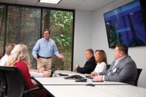 Fig1-project-management-team-meeting-Graycor