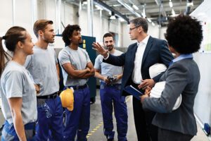 Fig1-company-manager-meeting-with-workers