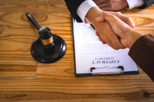contract-negotiation-legal-envato